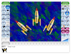 Screenshot of Tux Paint with three rocket ships at different angles.